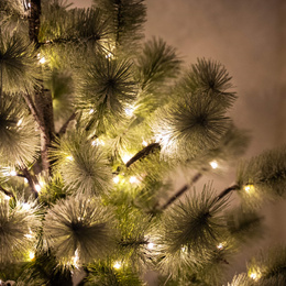 Choinka sztuczna na pniu z oświetleniem 128 LED drzewko świąteczne 150 cm ośnieżone